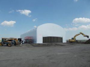 fabric structure on construction site near equipment