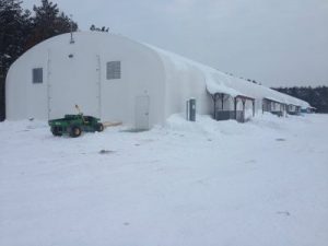 a fabric structure in snowy terrain